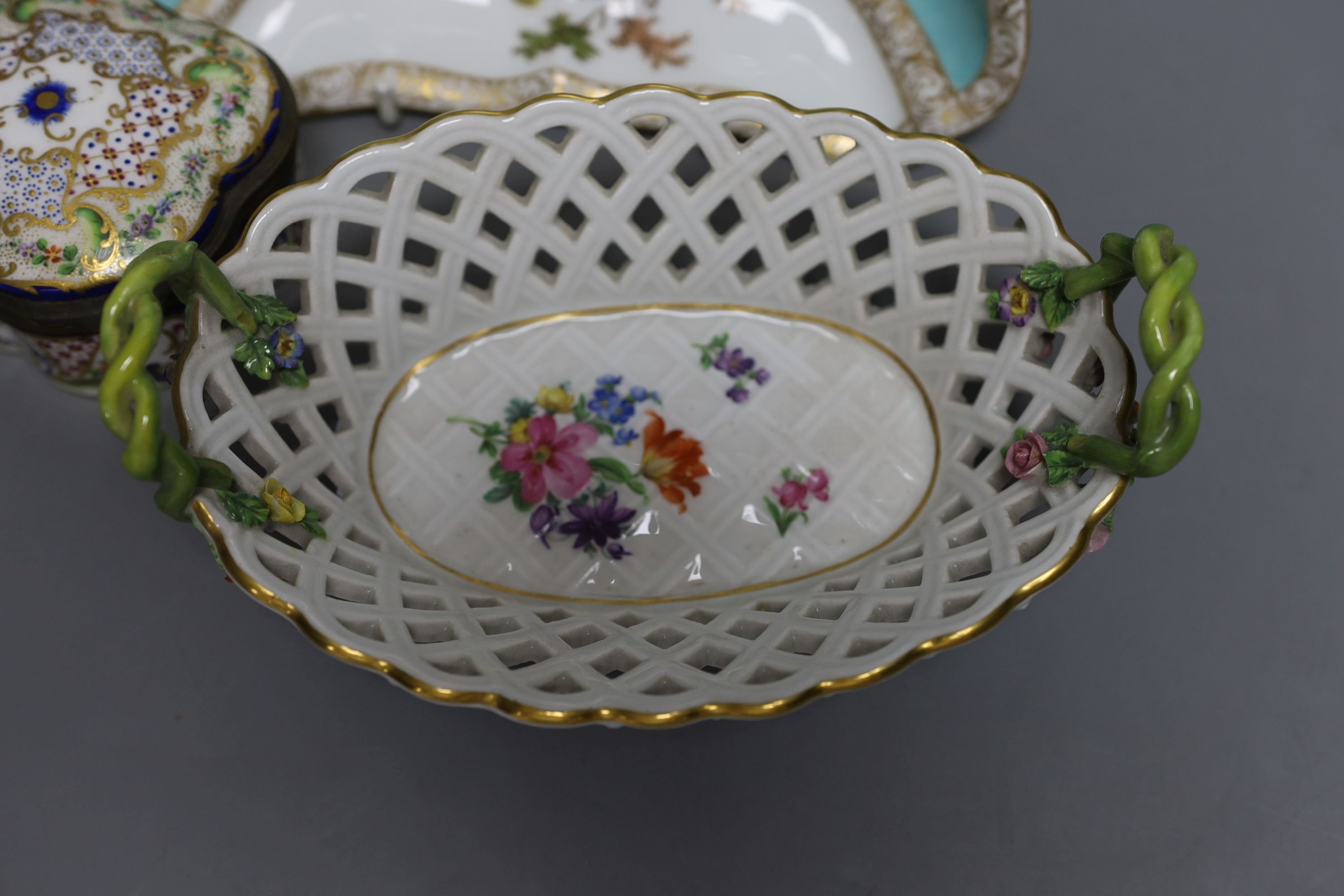 A moden Meissen figure of a bear, 11cm tall, together with a painted porcelain trinket box and two Meissen dishes (4)